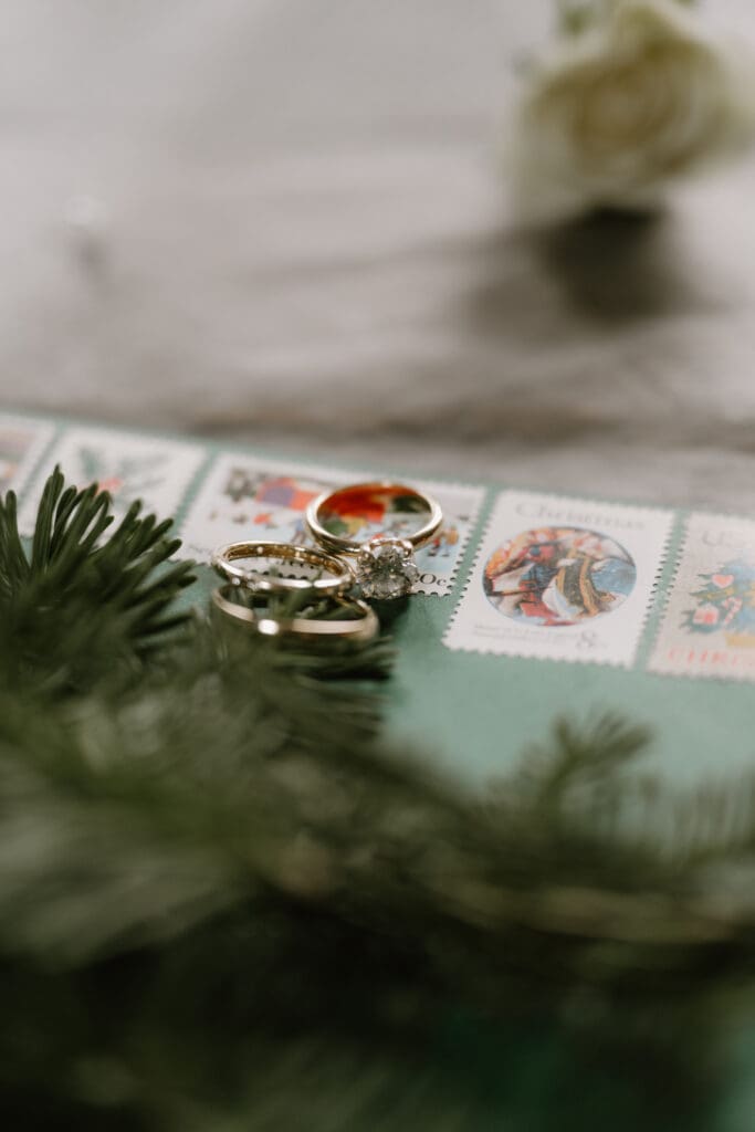 wedding rings on an invitation envelope