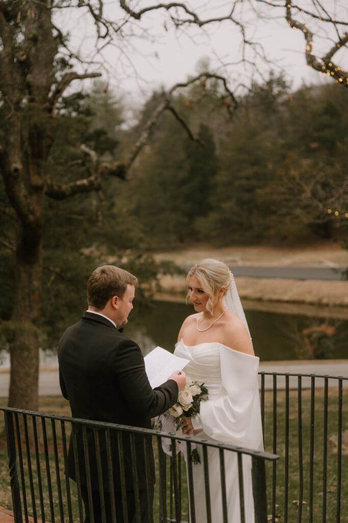 bride and groom exchange vows during first look big cedar lodge 