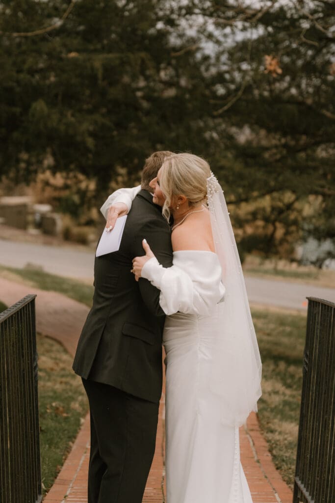 bride and groom exchange vows during intimate first look  