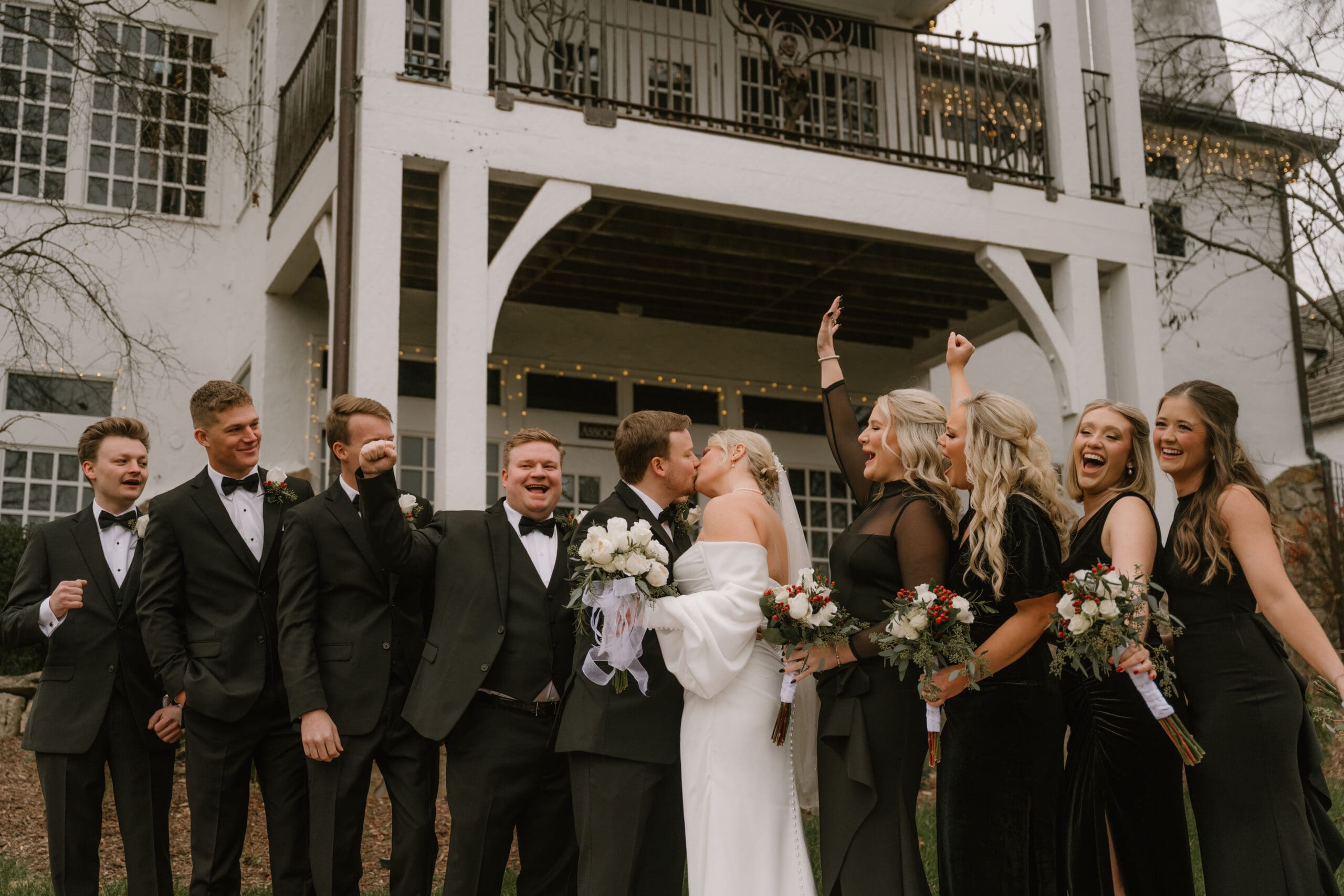 wedding couple with wedding party at big cedar lodge