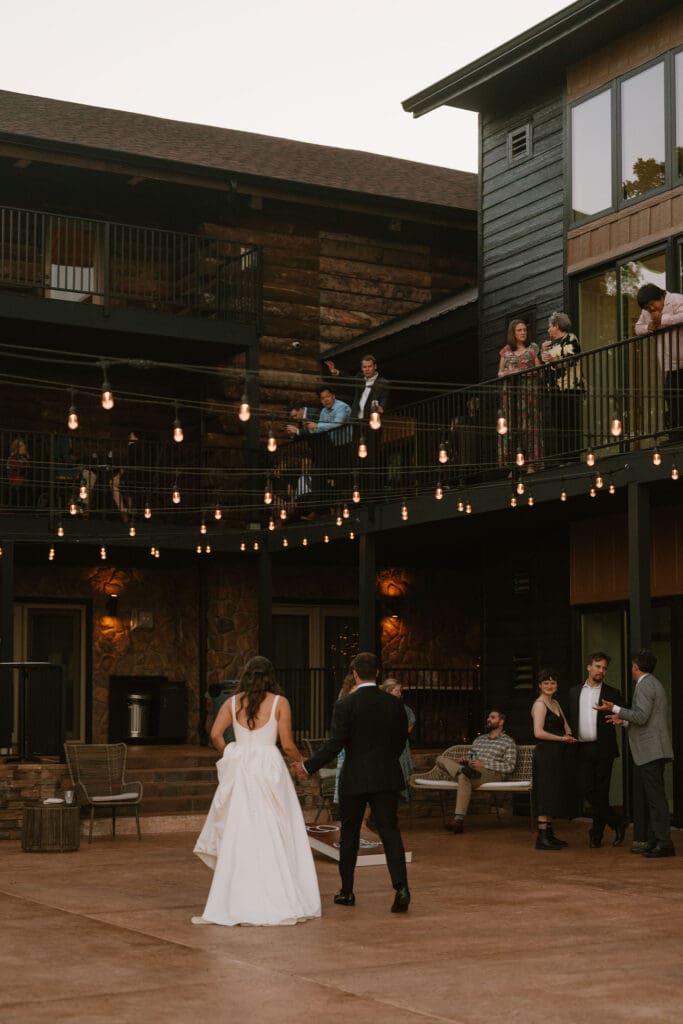 bride and groom at their reception at table rock lake wedding