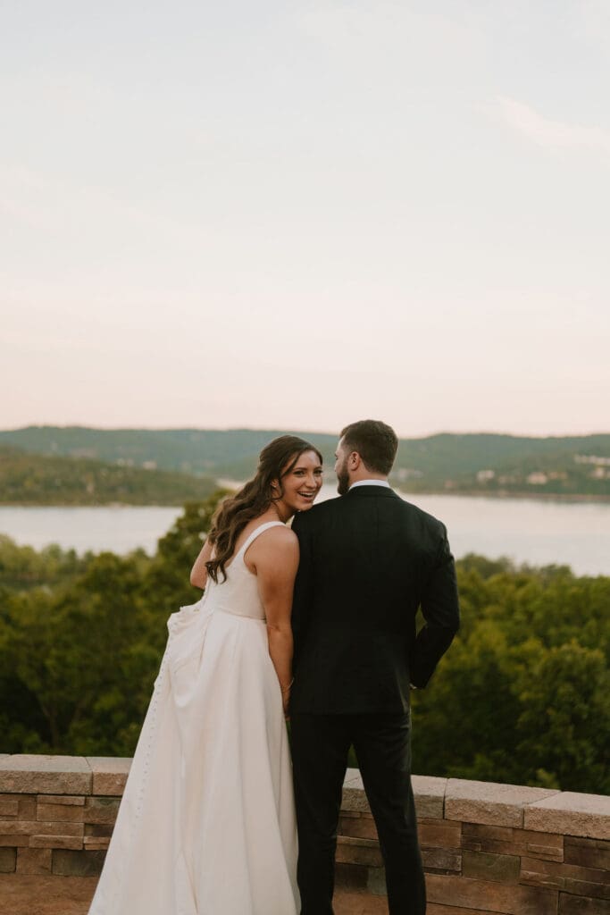 bride and groom overlooking table rock lake