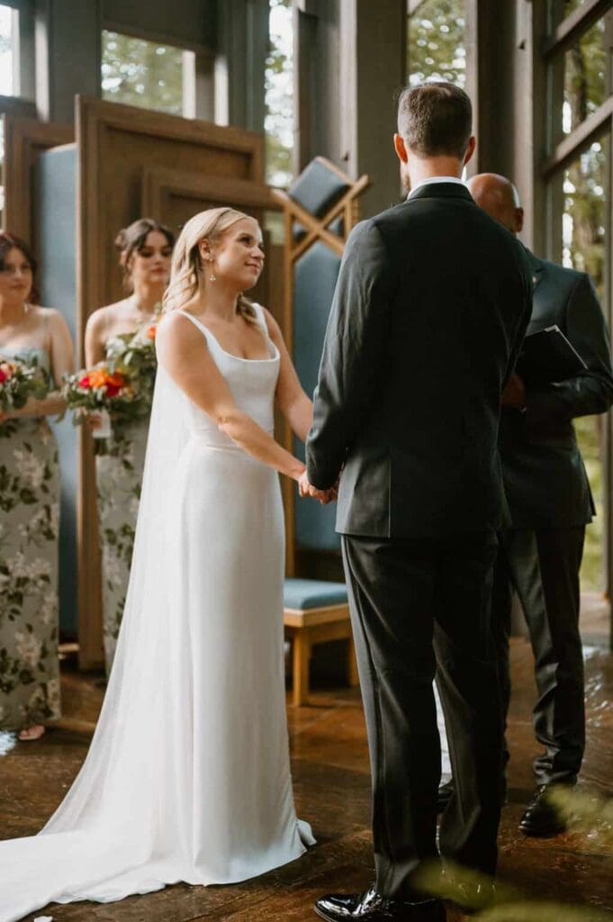 bride at alter at thorncrown chapel arkansas