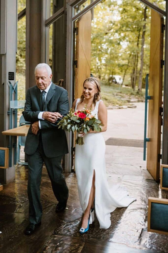 bride walking down the aisle at thorncrown chapel arkansas