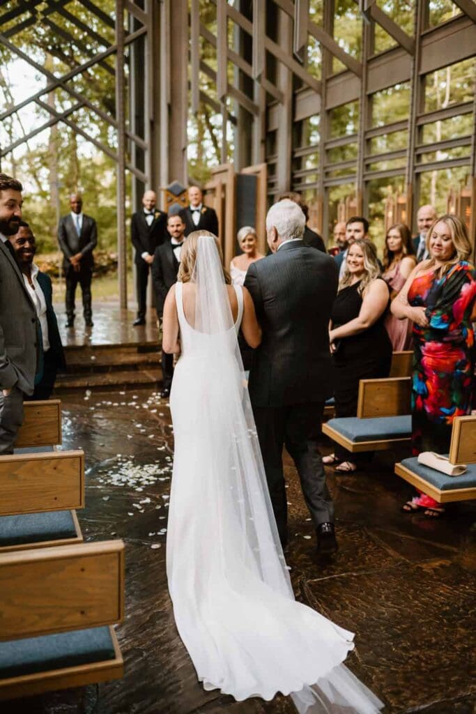 bride walking down the aisle at thorncrown chapel arkansas