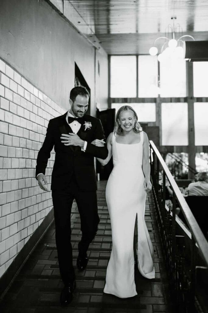 wedding couple entering reception in fayetteville arkansas