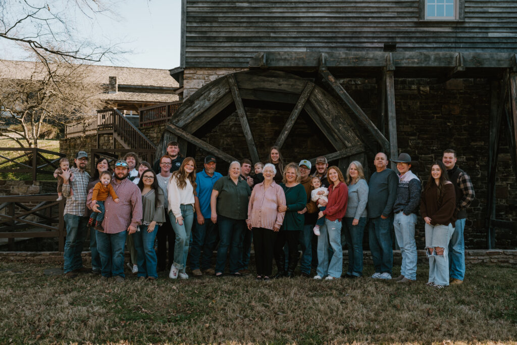 family taking photos at table rock lake