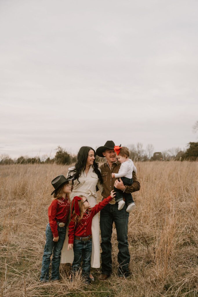 family taking photos in branson missouri