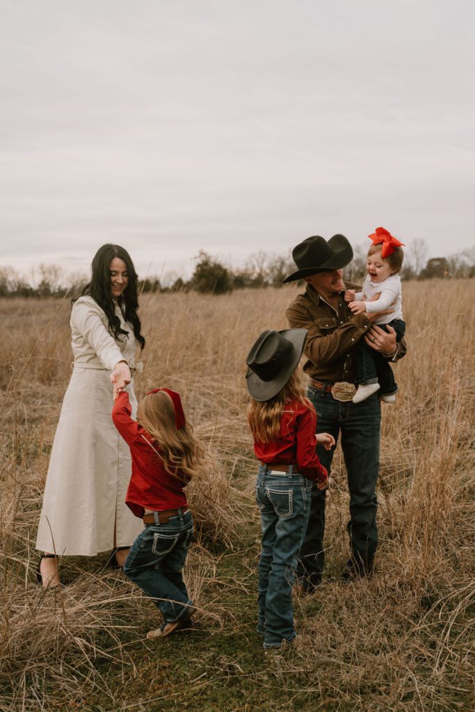 family taking photos in branson missouri