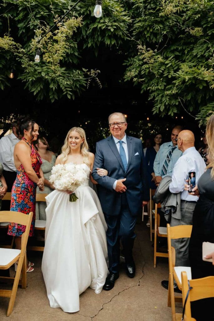 bride and dad during intimate wedding ceremony in st louis mo 