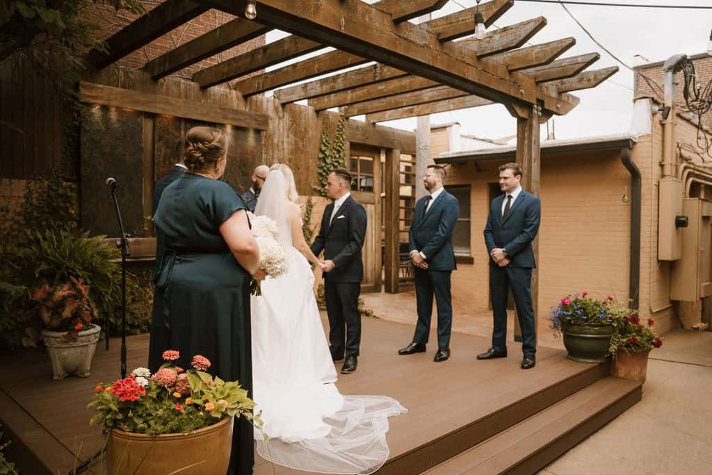 bride and groom during intimate wedding ceremony in st louis mo