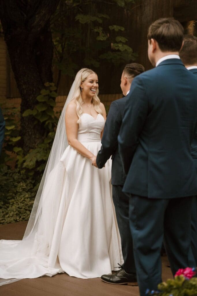 bride and groom during intimate wedding ceremony in st louis mo 