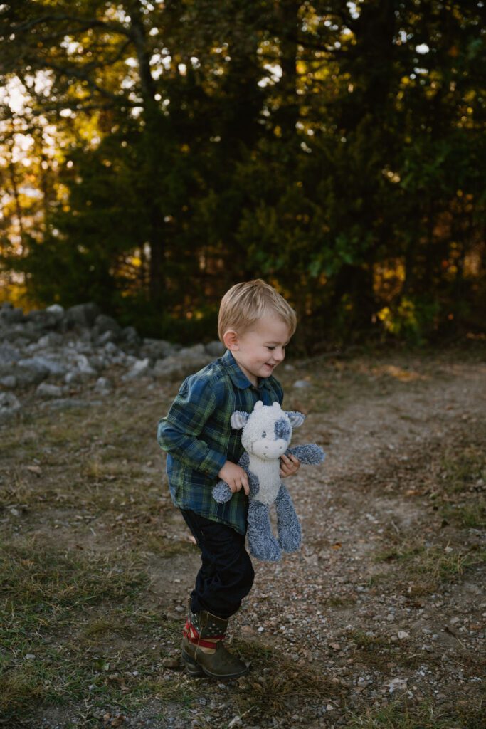 family taking photos at table rock lake