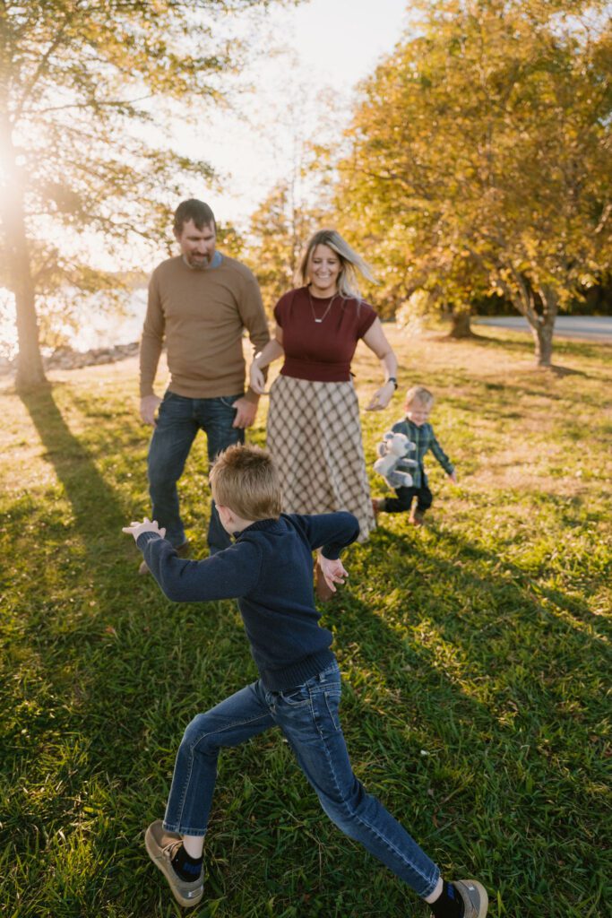 family taking photos at table rock lake