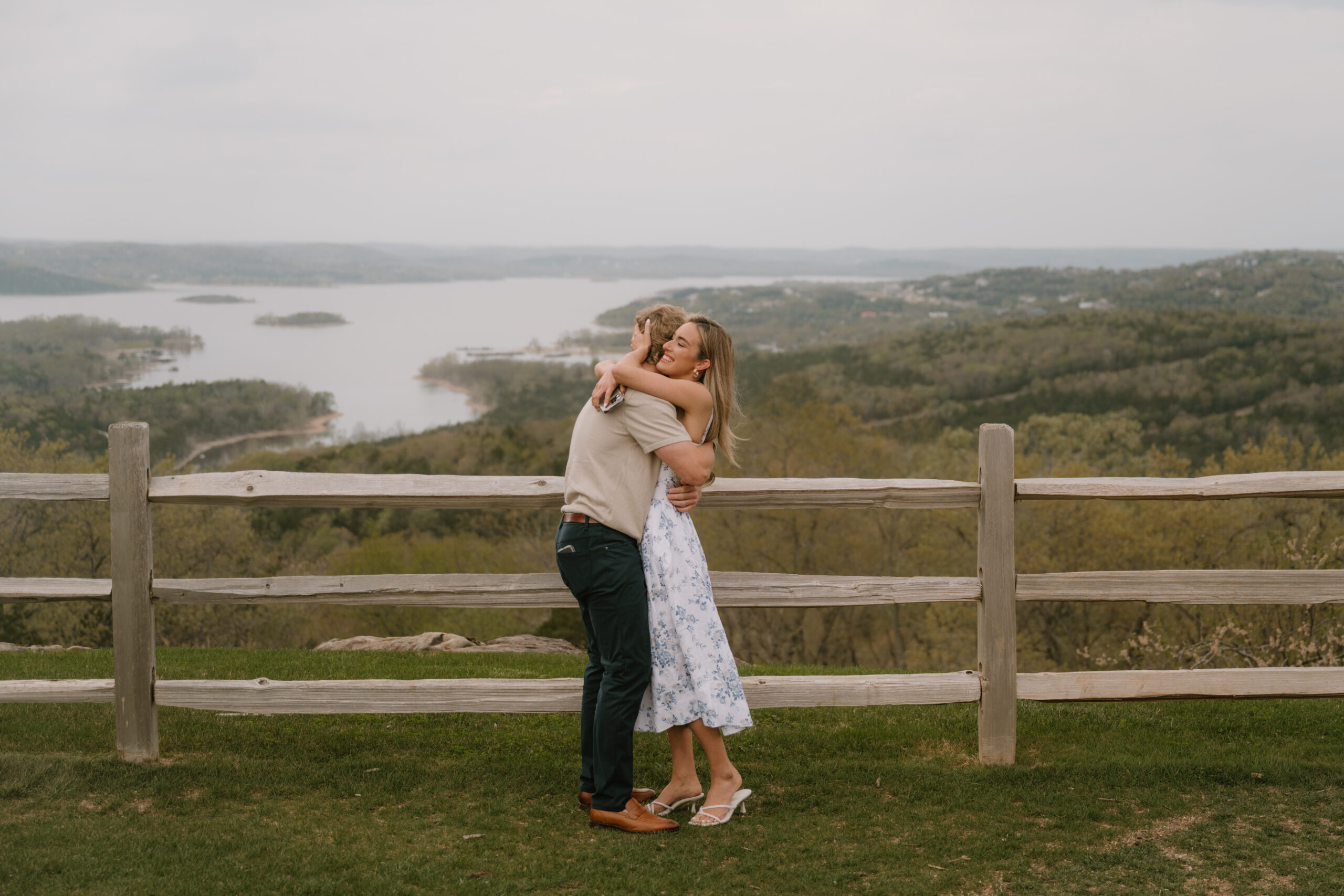 couple getting engaged at top of the rock