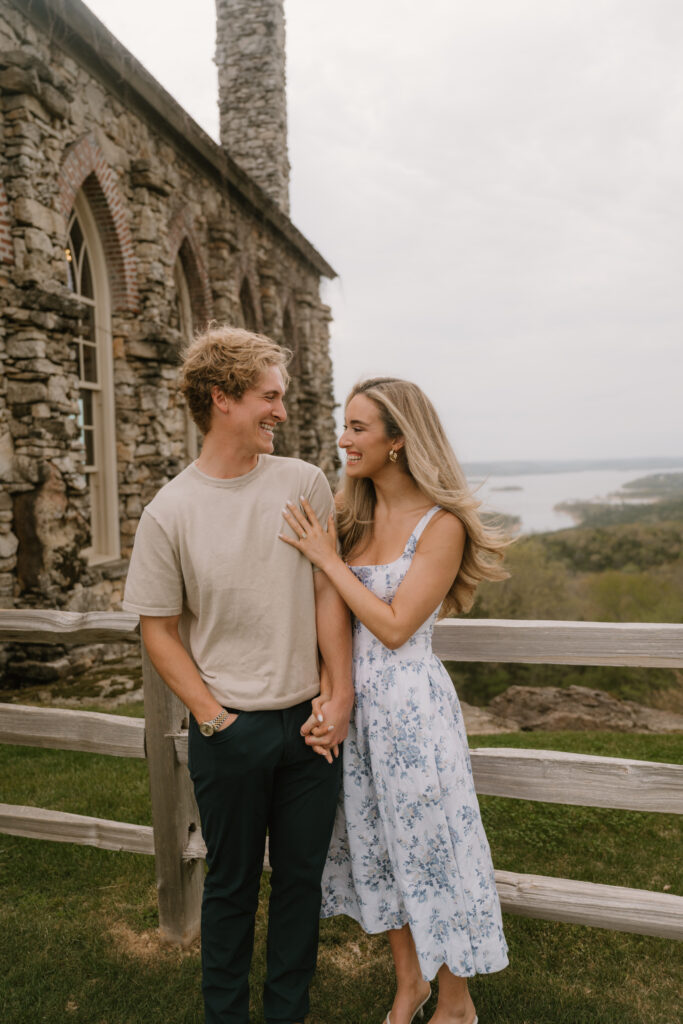 couple engagement pictures at top of the rock