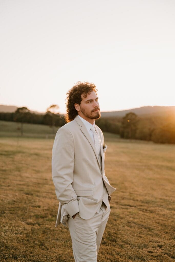 groom at plentywoods venue in elkins arkansas wedding
